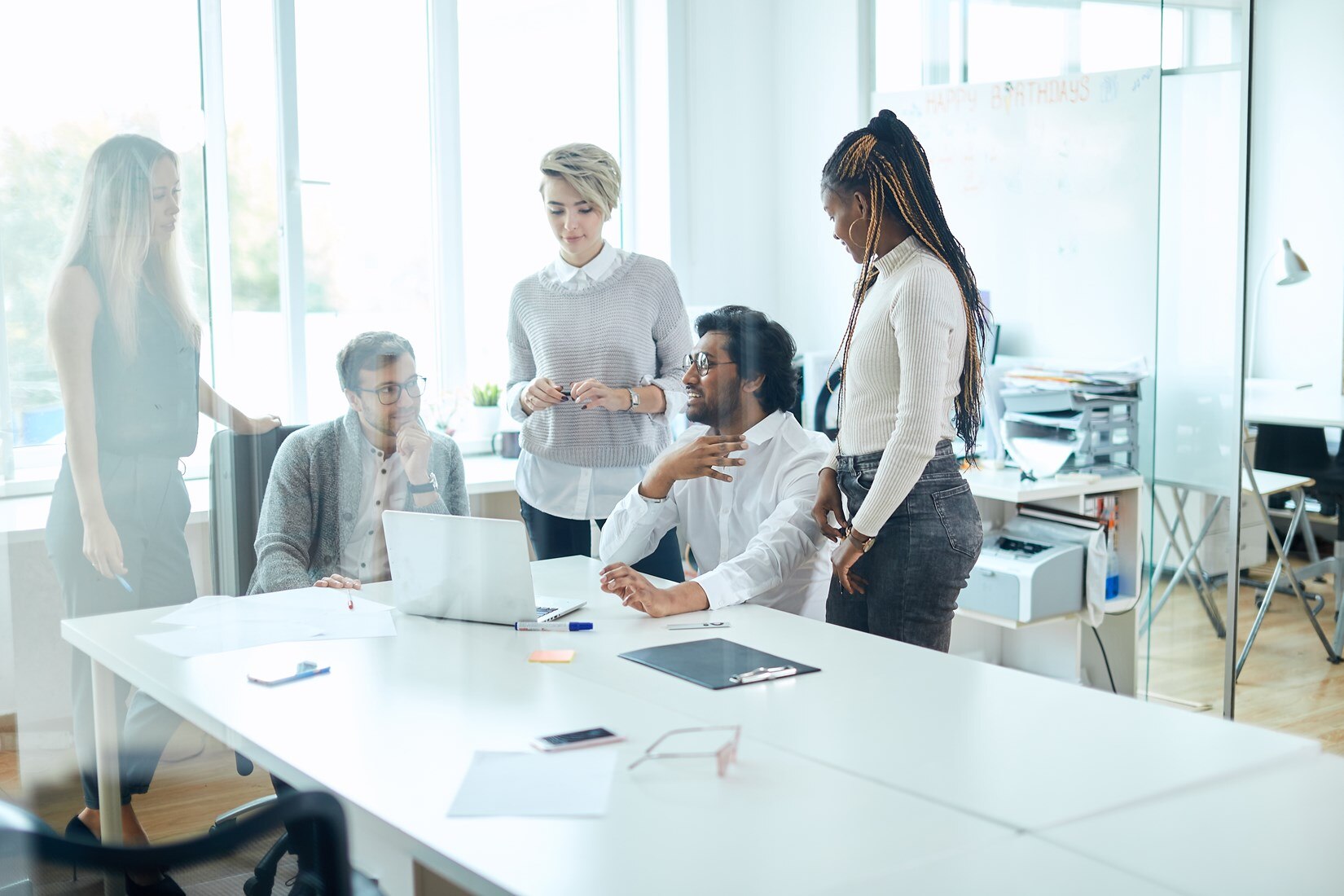 Group of professionals meeting in a conference room.