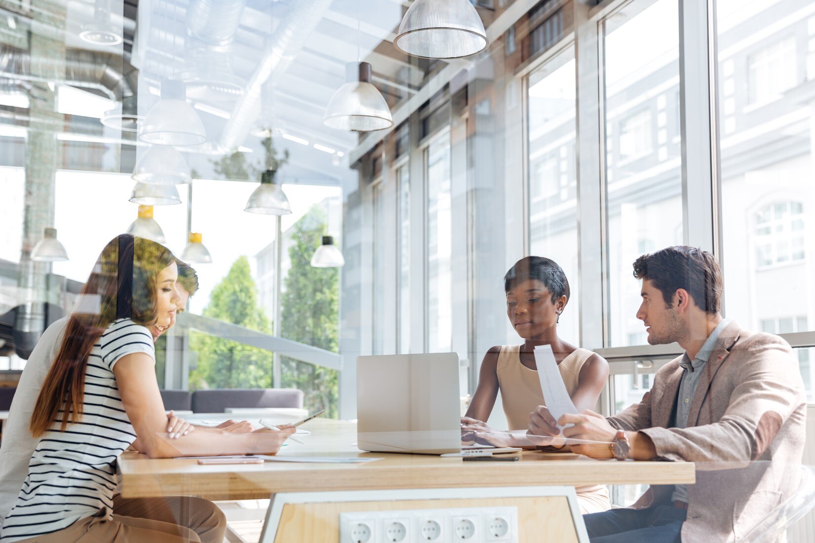 A group having a meeting in a conference room.